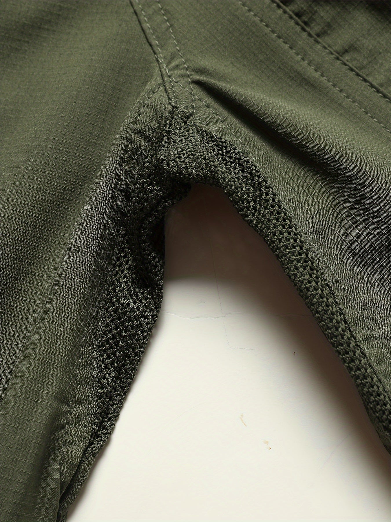 Multi-pocket combat shirt with quick-drying fabric, ventilation holes, and thin style.