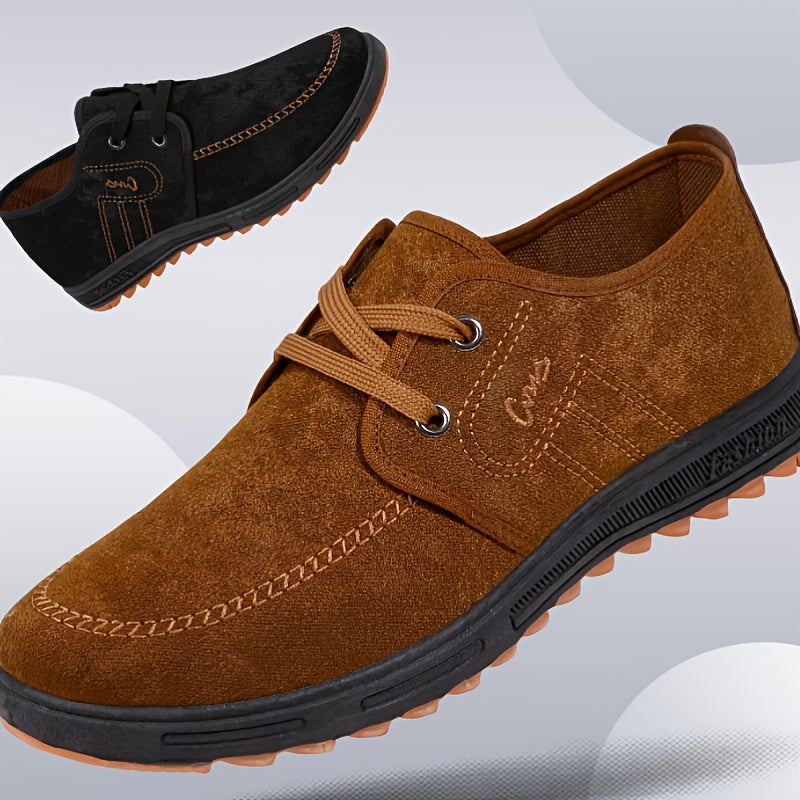 Comfortable men's slip-on canvas shoes in solid colors, ideal for outdoor activities.