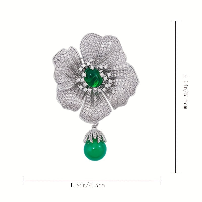 A stunning Camellia brooch featuring vibrant green cubic zirconia stones, exuding a luxurious and elegant style. An ideal Christmas gift, exuding a captivating atmosphere with its full drill design. Perfect for adding a touch of glamour to holiday