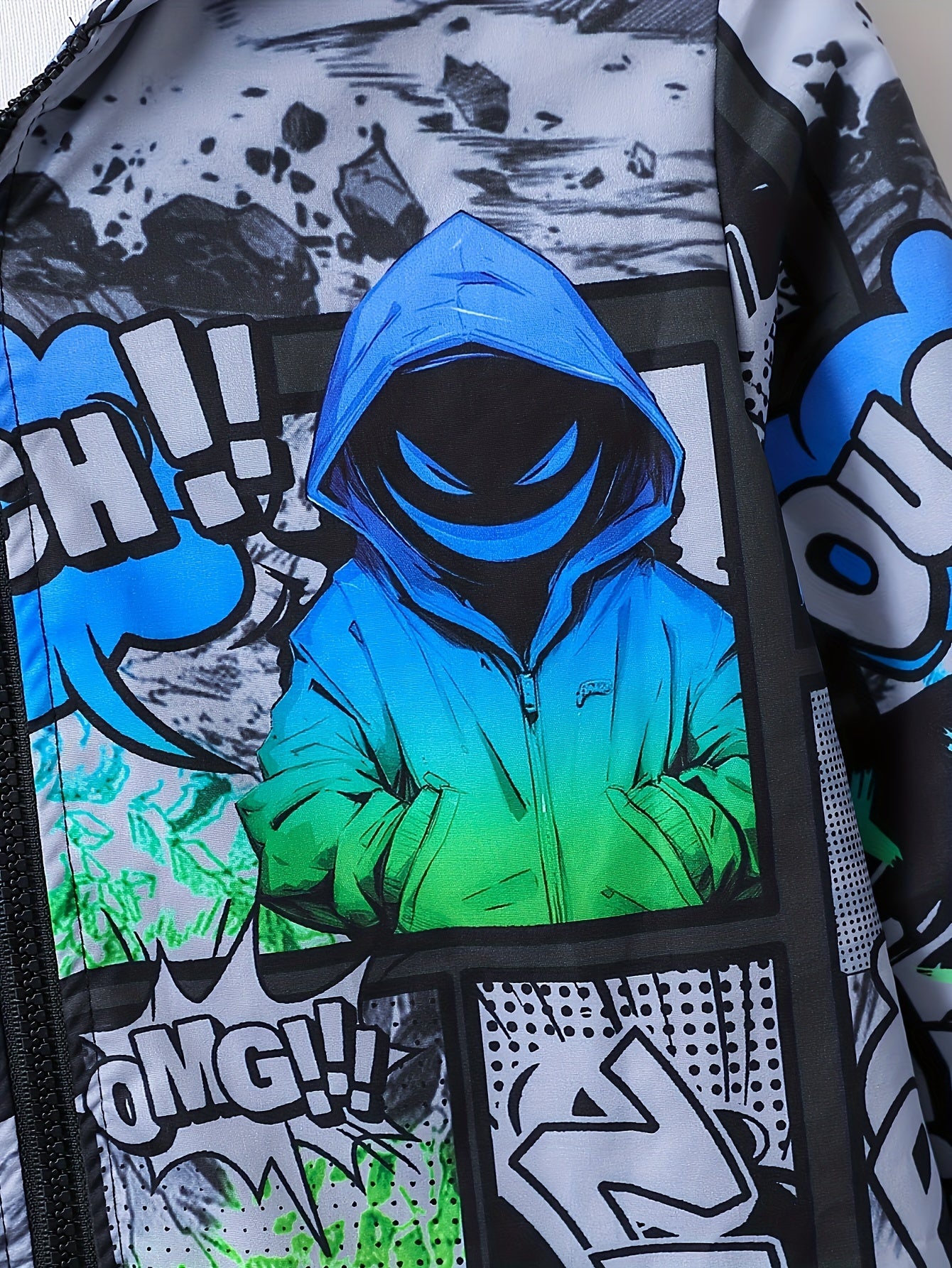 Boys' trendy hoodie with comic-style print and vibrant graffiti design for Fall/Winter.