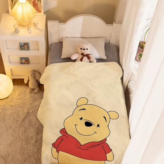 Celebrate Valentine's Day with a cozy Disney Winnie The Pooh flannel blanket! This soft blanket is available in multiple sizes and is lightweight yet warm, making it perfect for use in the living room, bedroom, guest room, school, office, or while