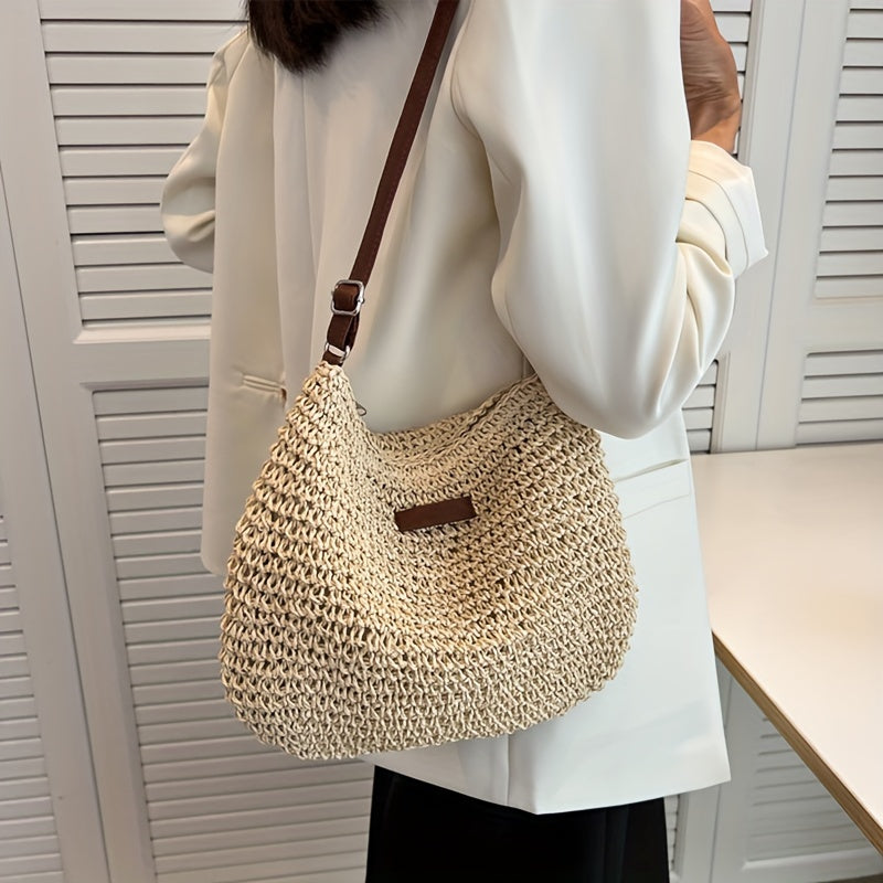 Handmade rattan crossbody bag for women, woven straw shoulder bag for summer.