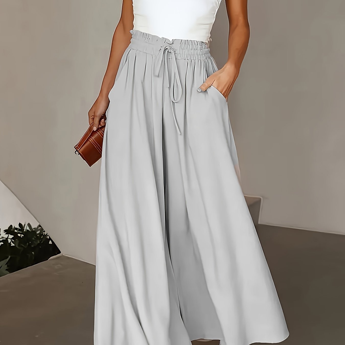 Wide leg lace-up pants for plus size women, perfect for spring and summer casual wear.