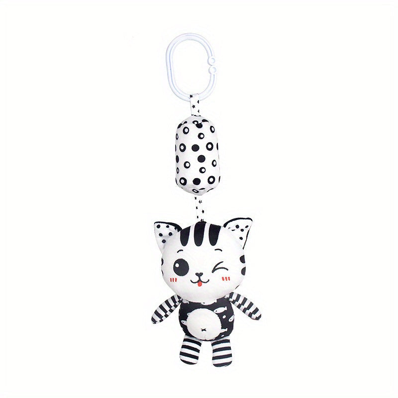 Black and white rattle wind chime for visual training in babies, perfect for early education and development. Makes a great gift for babies and toddlers.