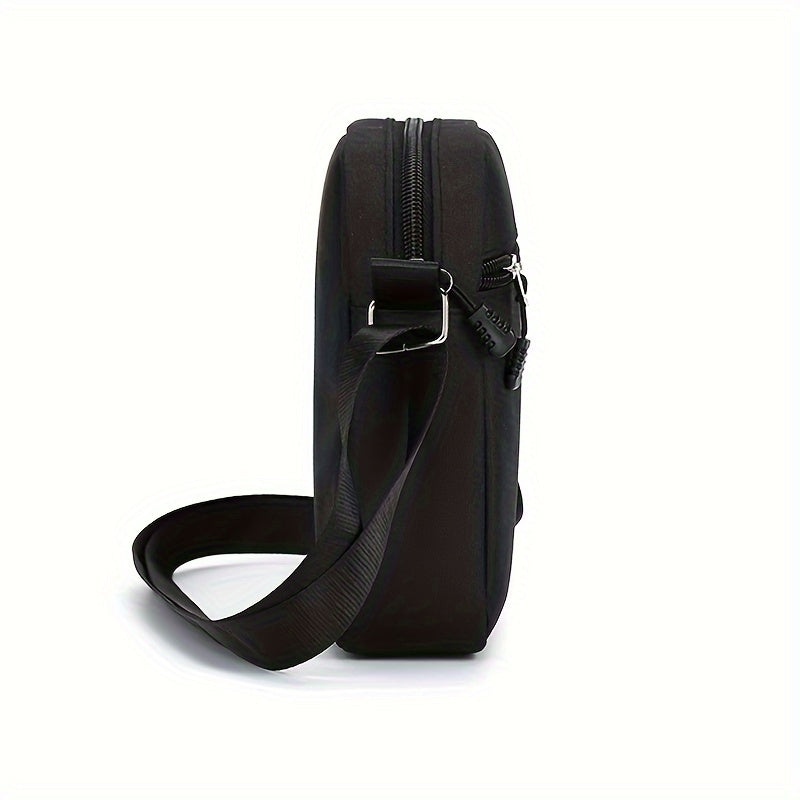 Black Oxford cloth shoulder bag with adjustable strap for daily use, hand wash or dry clean recommended.