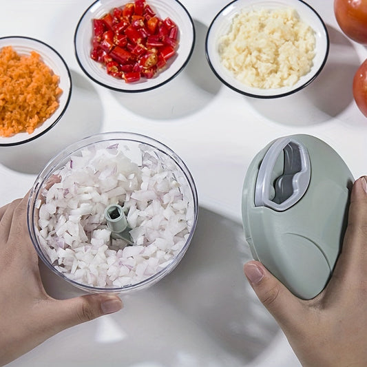 The Manual Vegetable Chopper is a versatile kitchen tool that combines a garlic press and grater in one. This hand-pulled chopper is perfect for chopping garlic, herbs, and onions without the need for electricity. Made from plastic and metal materials