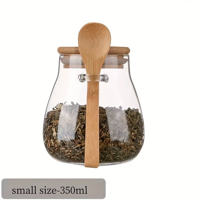 Introducing a single glass jar with a bamboo lid, designed with a wide opening and leak-proof features. This jar includes a spoon and can be reused. Perfect for storing coffee beans, tea, grains, dried fruits, and more. Available in three sizes