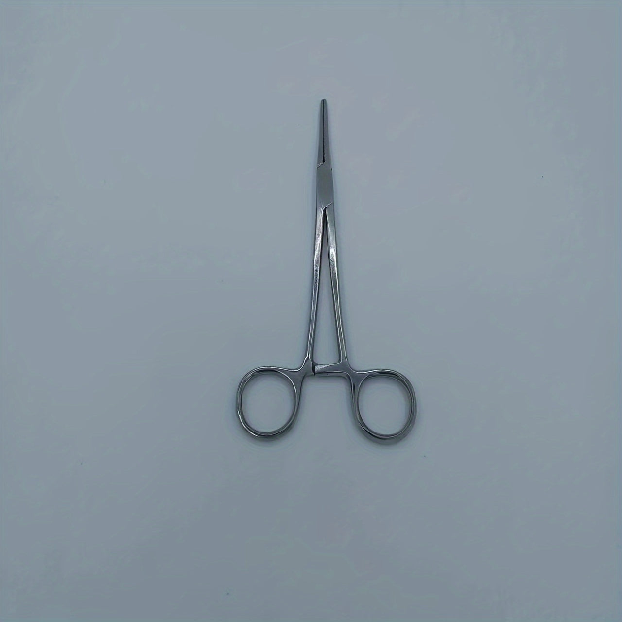 1pc Stainless Steel Hemostatic Forceps with Curved/Straight Tips, Ergonomic Handles, Durable Metal Construction.