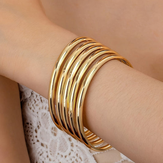 Set of 5 Gold-Plated Iron Bangle Bracelets, Bohemian and Hip-Hop Inspired, Sleek and Stylish Design, Mix and Match Stackable Accessories for Women, Ideal for Any Occasion, Great for Parties and Gifting, Versatile All-Season Fashion Statement