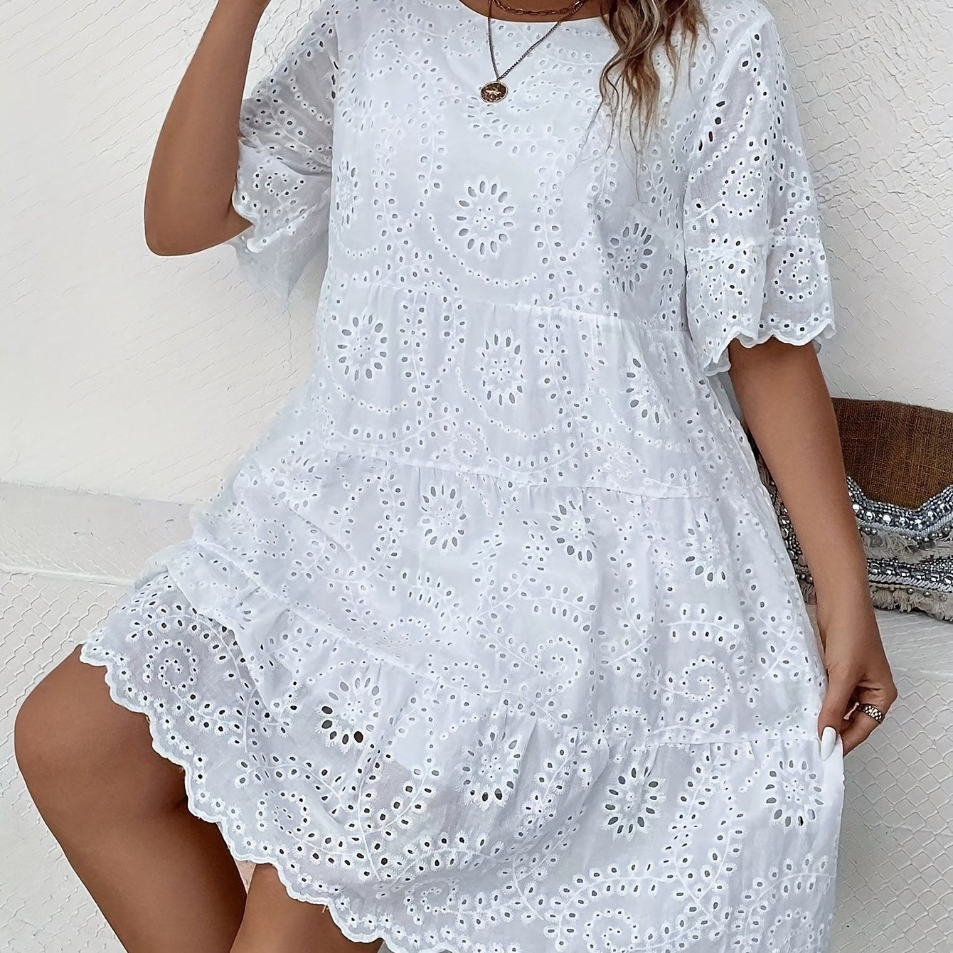 Lace-trimmed plus size dress with eyelet embroidery, round neck, short sleeves, and mesh fabric, ideal for spring and summer.