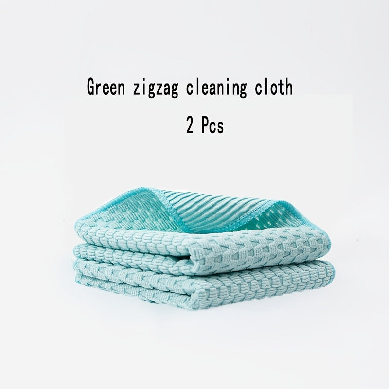 Two pieces of highly absorbent microfiber cleaning cloths with a thick and textured design, perfect for dishwashing and wiping surfaces. Featuring a colorful and space-themed pattern, these kitchen towels are ideal for use at home.