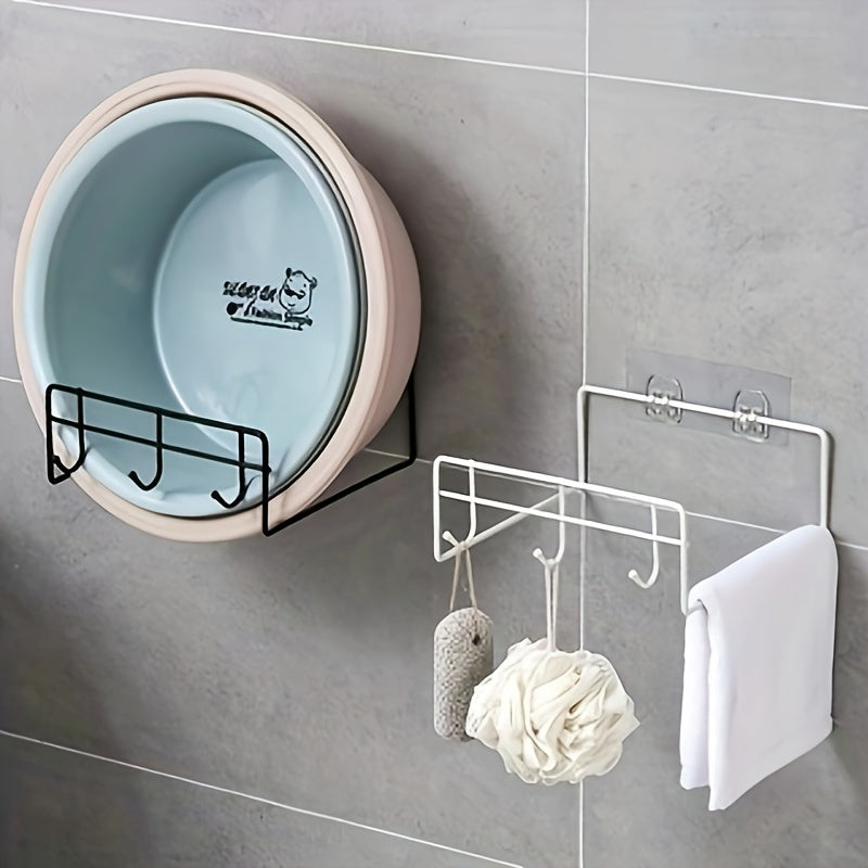 Wall-mounted shower caddy organizer for toiletries with adhesive hook.