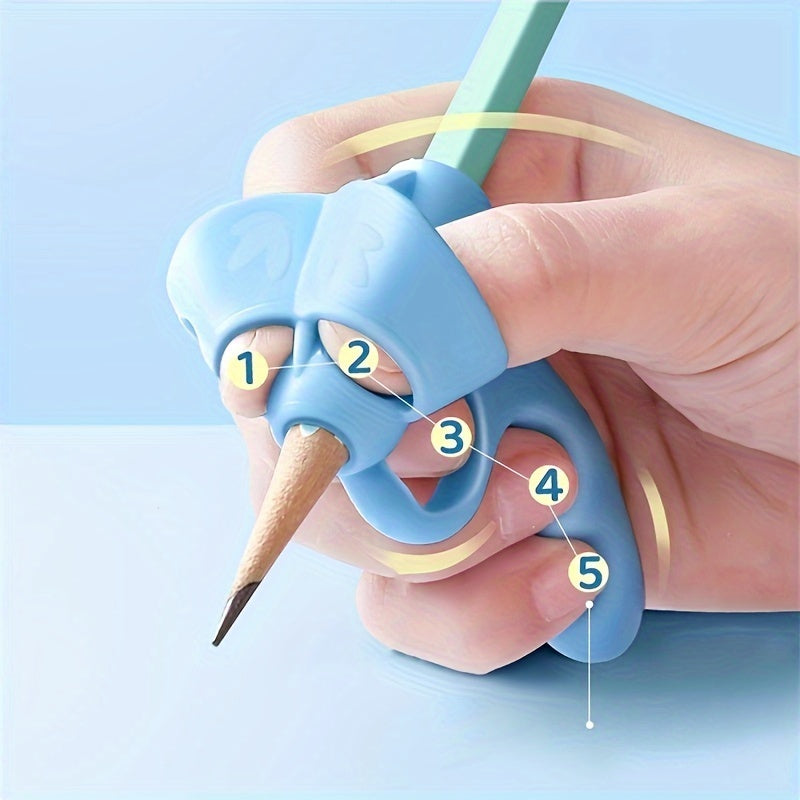 Writing corrector set with soft rubber grip for improving handwriting posture.