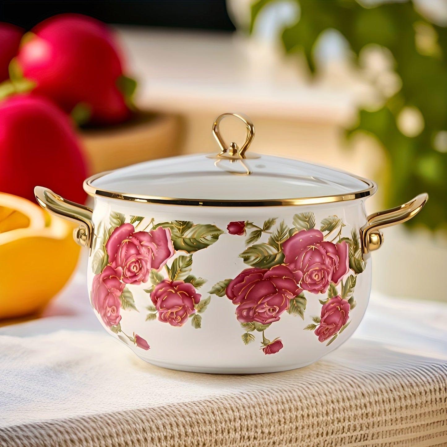 Luxurious stockpot with gold handle and lovely rose flower enamel design. Comes with a durable glass lid and is offered in four different sizes. Perfect for high-end cooking in your home or outdoor kitchen.