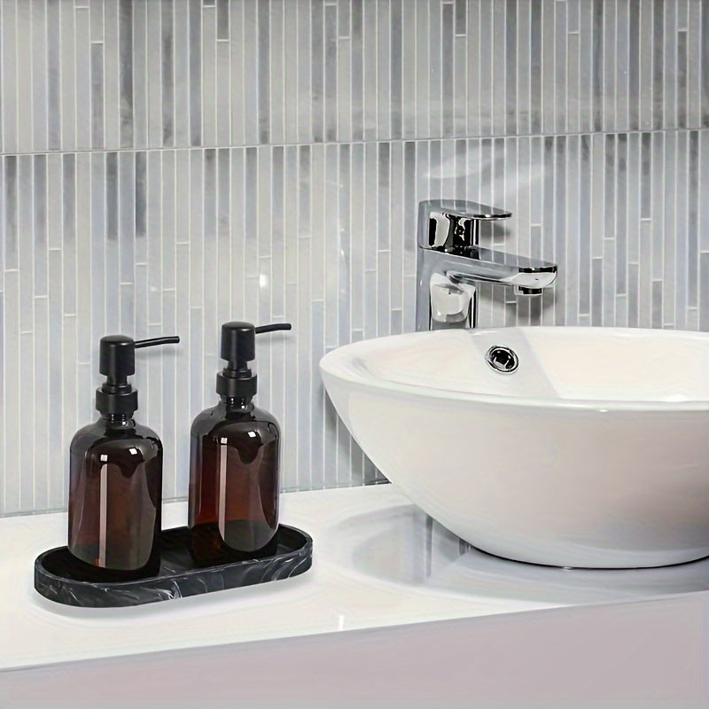 Silicone oval vanity tray with soap dispenser and sponge holder for bathroom décor.