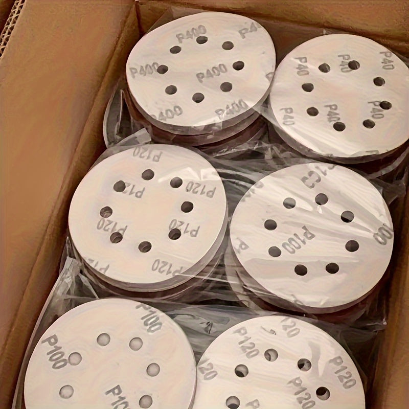 100 5-inch 125mm circular sandpaper with 8 holes, hook and ring system, used for polishing.