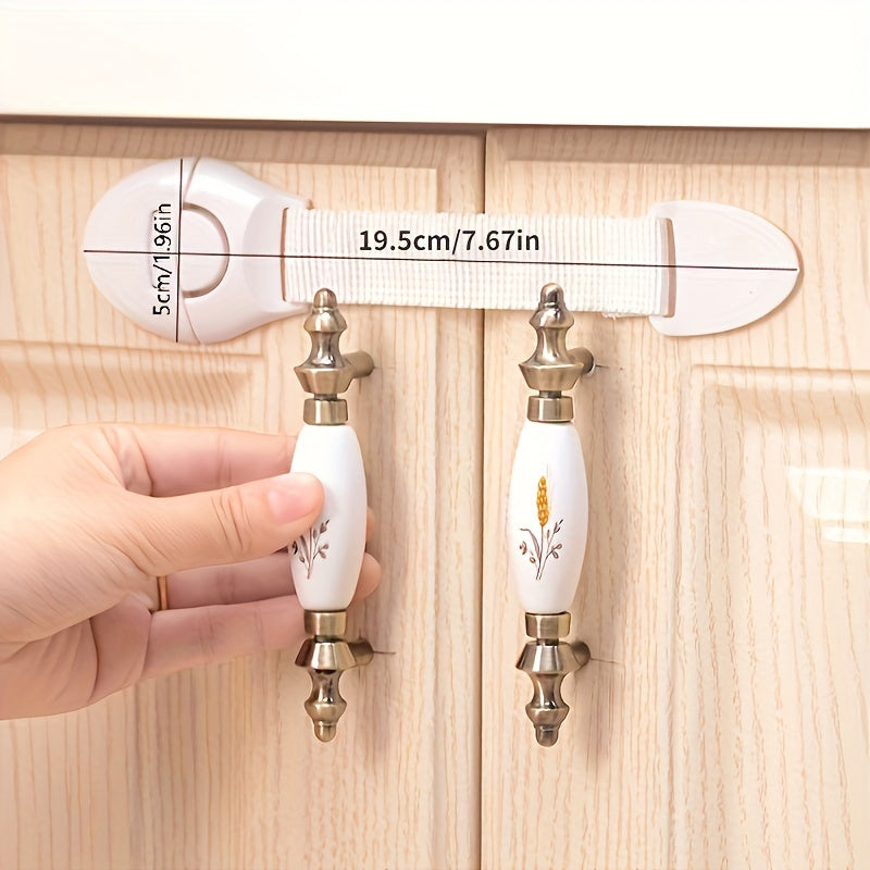 Secure your drawers and cabinets with this 10-pack of white safety locks and straps. Made of lead-free plastic, these adjustable anti-pinch latches are perfect for children aged 3-6 years and 6-8 years. Keep your little ones safe with these easy-to-use