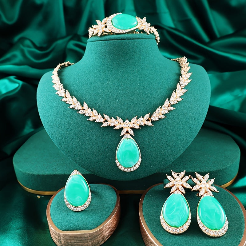 Experience luxury with our 18K Gold Plated Alloy Jewelry Set adorned with sparkling rhinestones. This 4-piece set oozes elegance and is perfect for your vacation outfits. Ideal for weddings, gifts, and Valentine's Day, our Gold Plated Bridal Party Sets