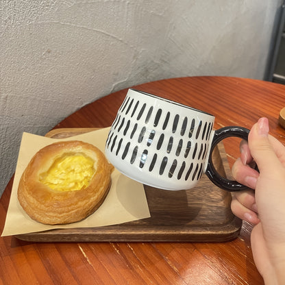 Stylish black and white checkered ceramic coffee mug - Ideal for home or restaurant use.