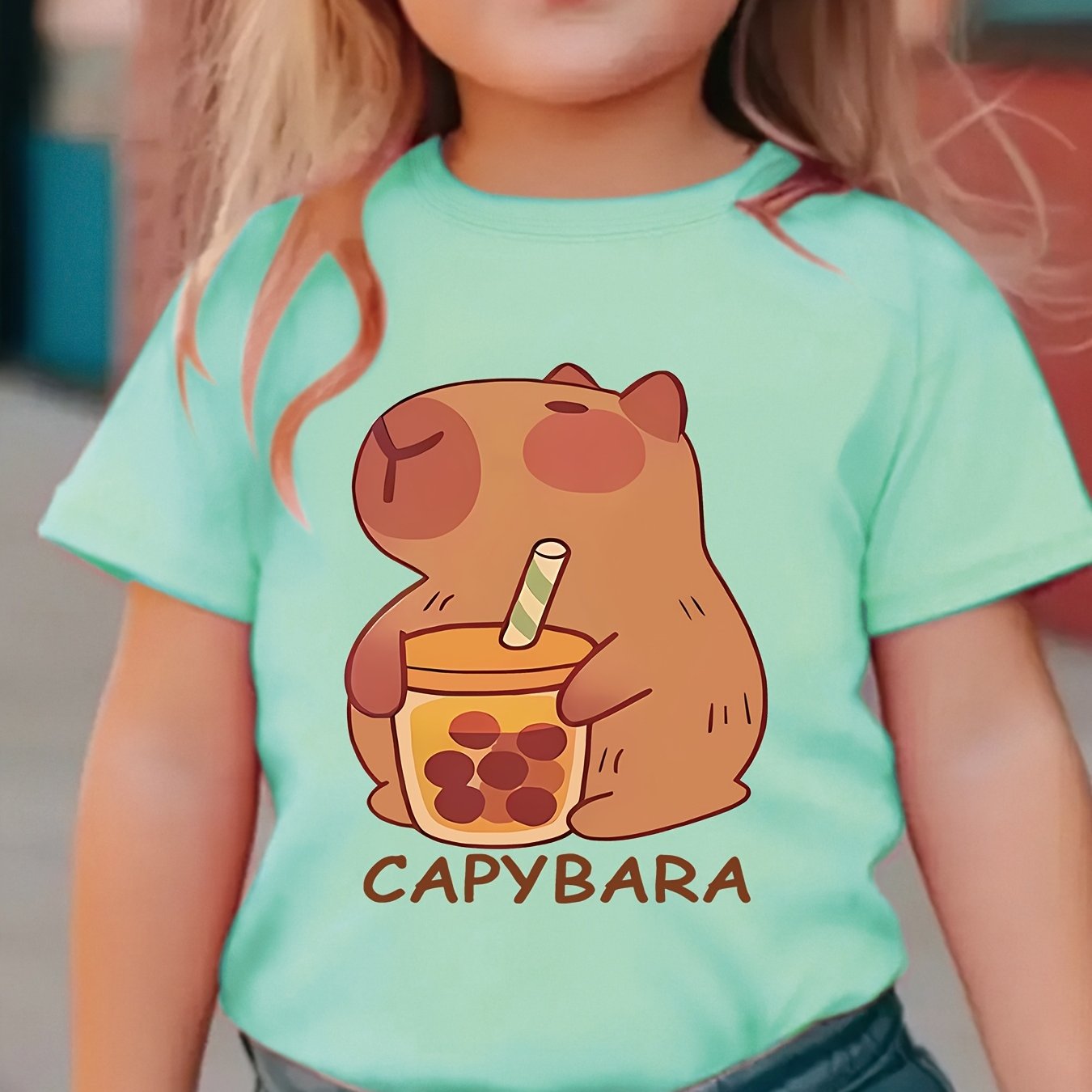 Girls' cozy round neck t-shirt with capybara drinking milk tea pattern, perfect for spring and summer.