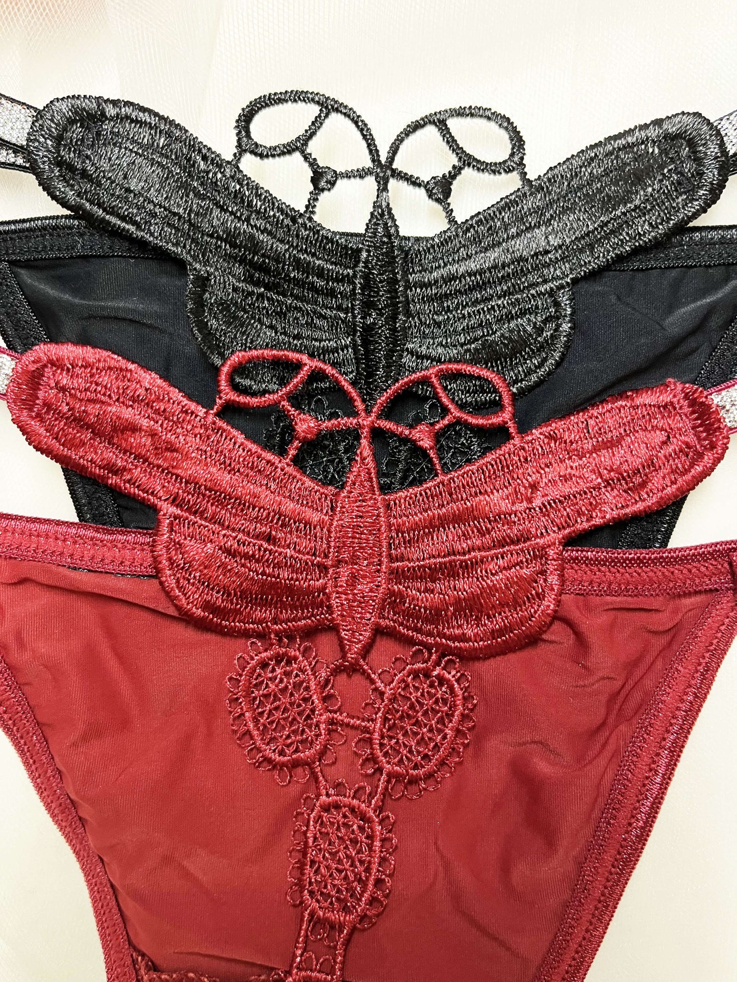 Glittery butterfly embroidered thong pants in two colors with a thin belt