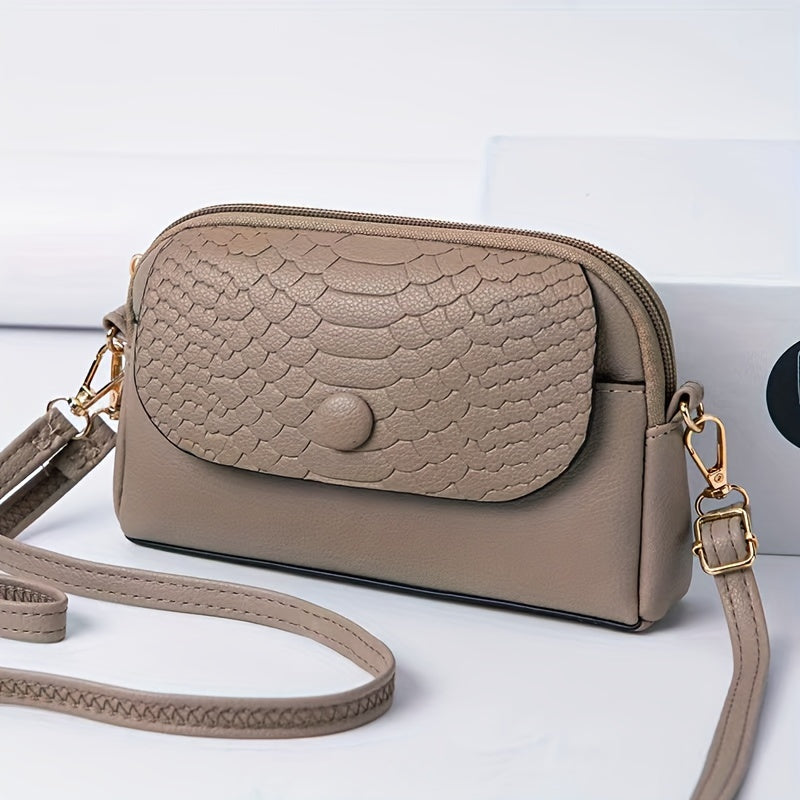 Stylish mini crossbody bag for women with removable strap and zipper closure. Suitable for commuting and shopping.