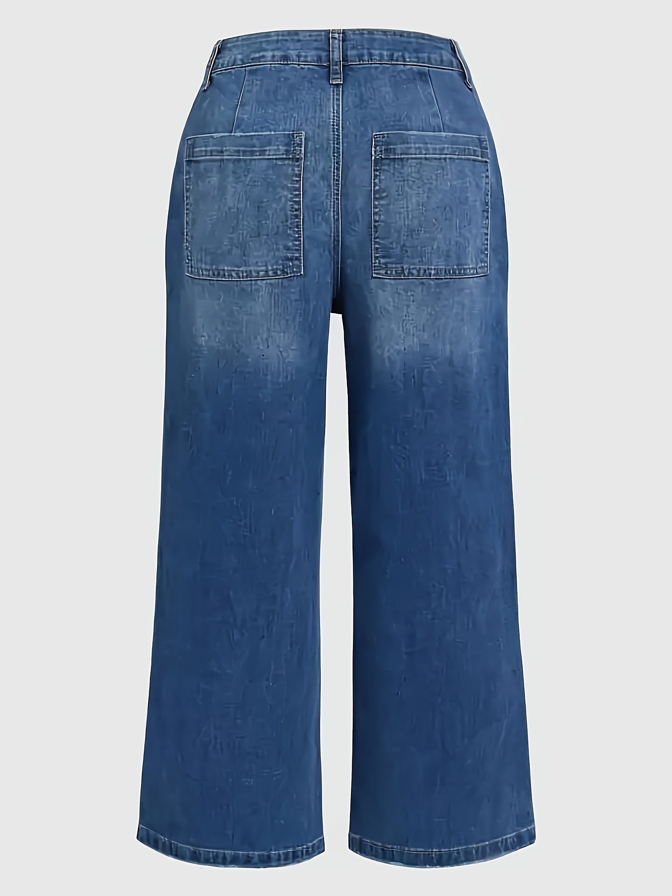 Wide leg high-waisted denim jeans for women in soft blue cotton with slant pockets, loose fit, and mid-rise. Comfortable for all seasons.