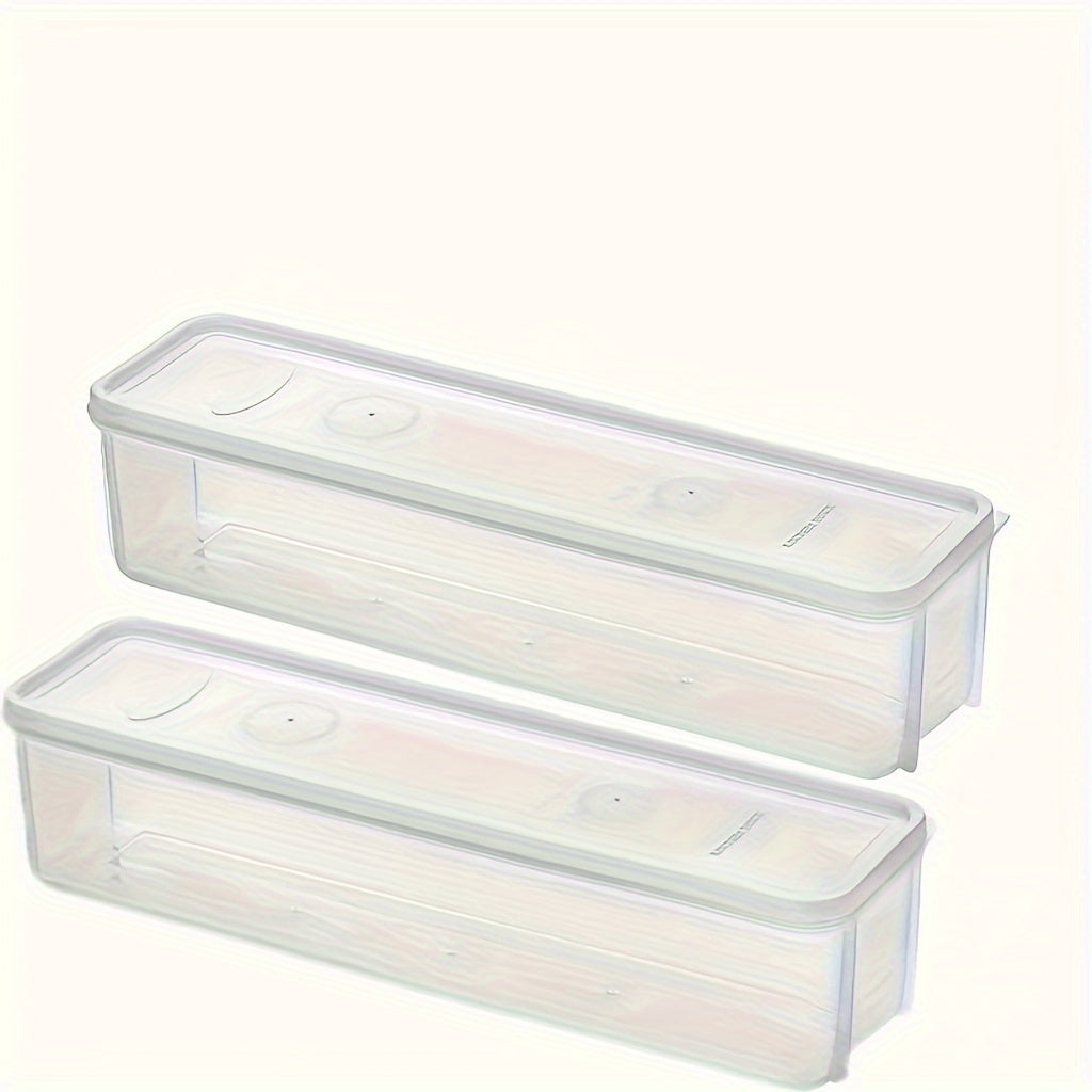 Two large plastic food storage containers designed for organizing vegetables in the refrigerator. These durable kitchen organization boxes feature a secure seal and require no electricity. Perfect for use as desk and drawer organizers for home storage.