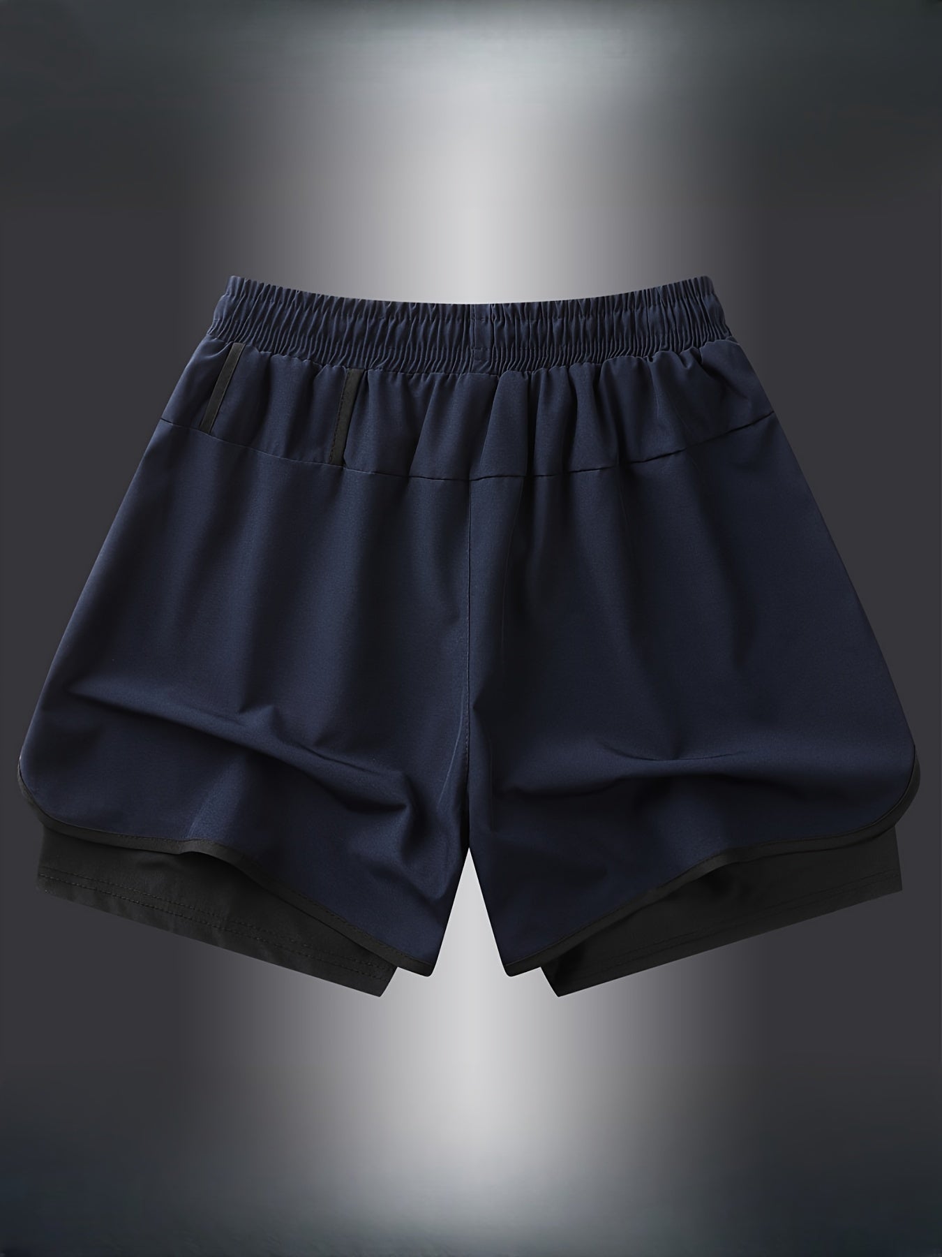 Men's navy blue athletic shorts with black accents, quick-dry, breathable, elastic waistband with drawstring, made of polyester and spandex blend.