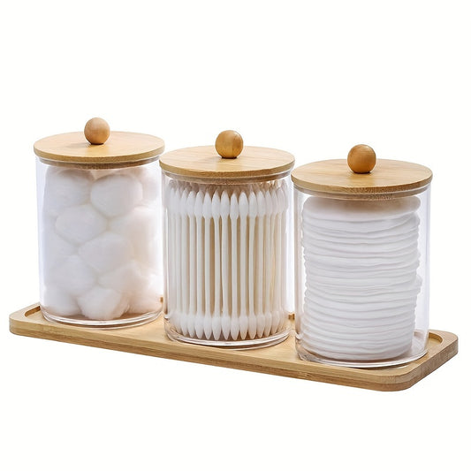 Set of 3 cotton swab/ball/pad holders with tray, apothecary jar with wood lids, and clear bathroom storage containers.