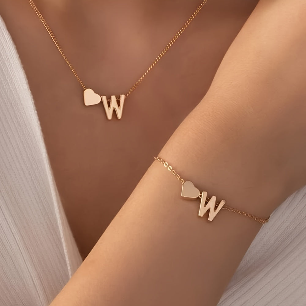 Chic two-piece set with metal heart and letter necklace and bracelet, ideal for daily wear.