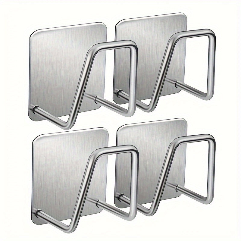 One set of 4 stainless steel sponge drain racks with rag hooks, ideal for storing and drying sponges in the kitchen. Features a self-adhesive design for easy installation.