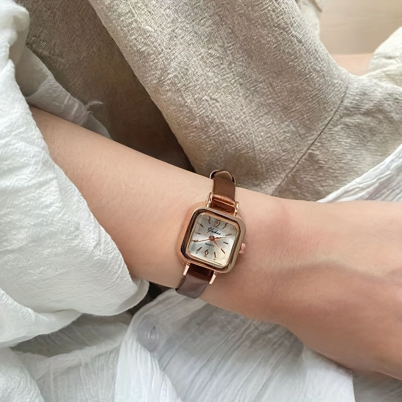 Sleek design mini square quartz watch with faux leather strap for women.