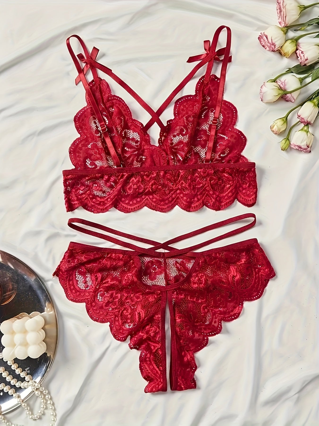 Floral lace lingerie set with push-up bra and strappy thong for women.