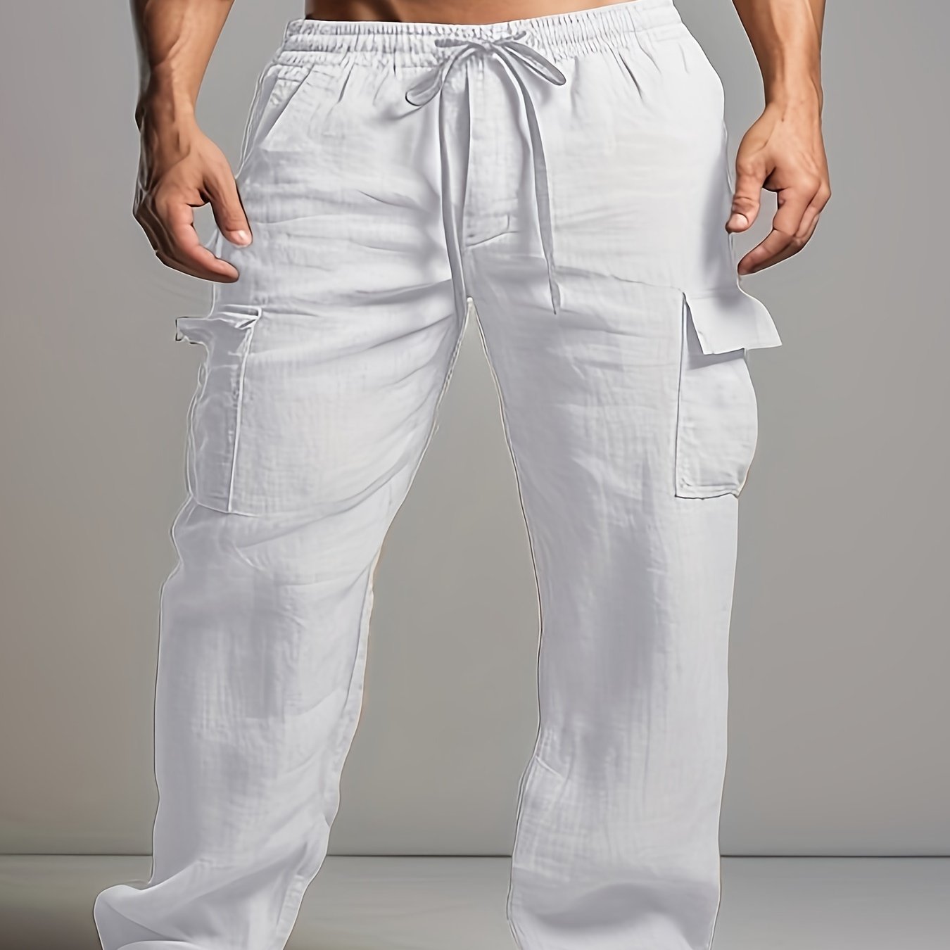 Retro men's cotton and linen drawstring trousers with multiple pockets for outdoor daily wear.