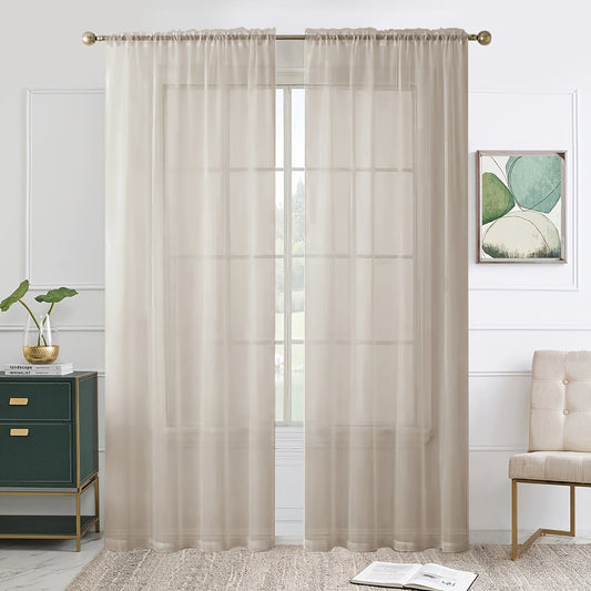 Add a touch of elegance to your kitchen, bedroom, or living room with this single panel sheer curtain. Perfect for letting in natural light while still providing privacy. Features a rod pocket design for easy hanging. Enhance your home decor with this