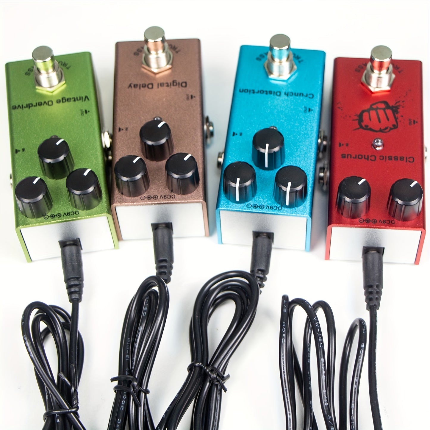 Mini electric guitar pedal with classic overload metal distortion, analog and digital delay effects. Operates on DC 9V power. Eid Al-Adha Mubarak.