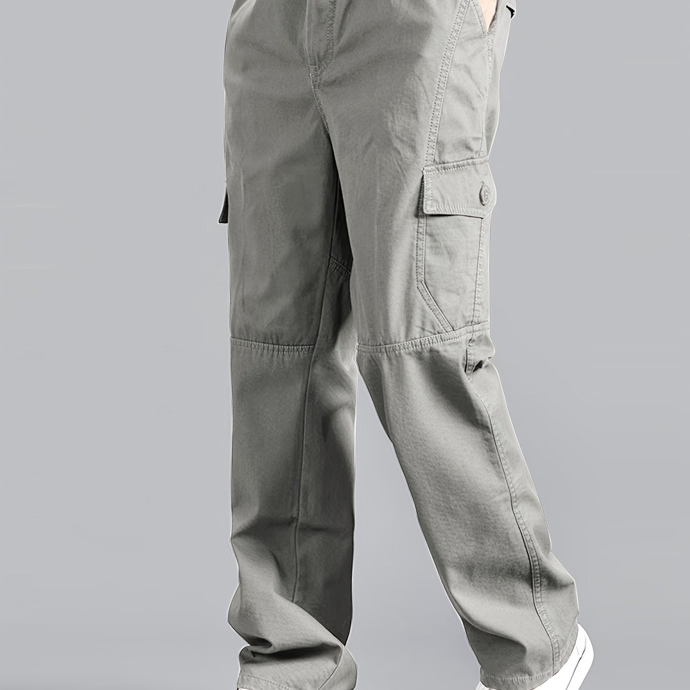 Casual cotton cargo pants for men, with solid color, multi-pocket design, loose fit, and non-stretch woven fabric. Ideal for daily wear in the Spring/Fall Collection.