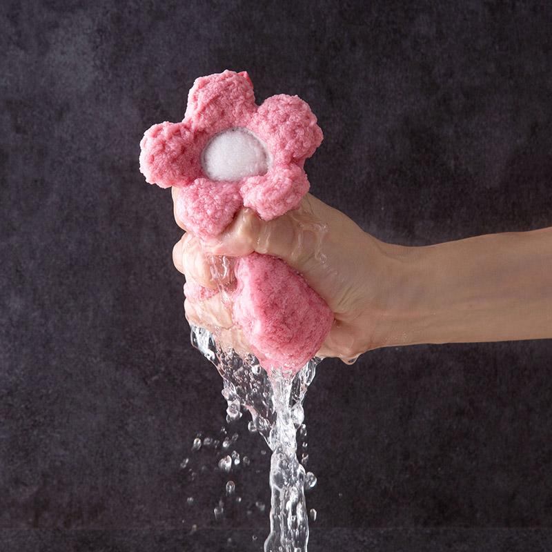 Decorative crochet flower hand towel made of absorbent microfiber with hanging loop. Perfect for kitchen or bathroom use in pink, mint green, white, or brown.