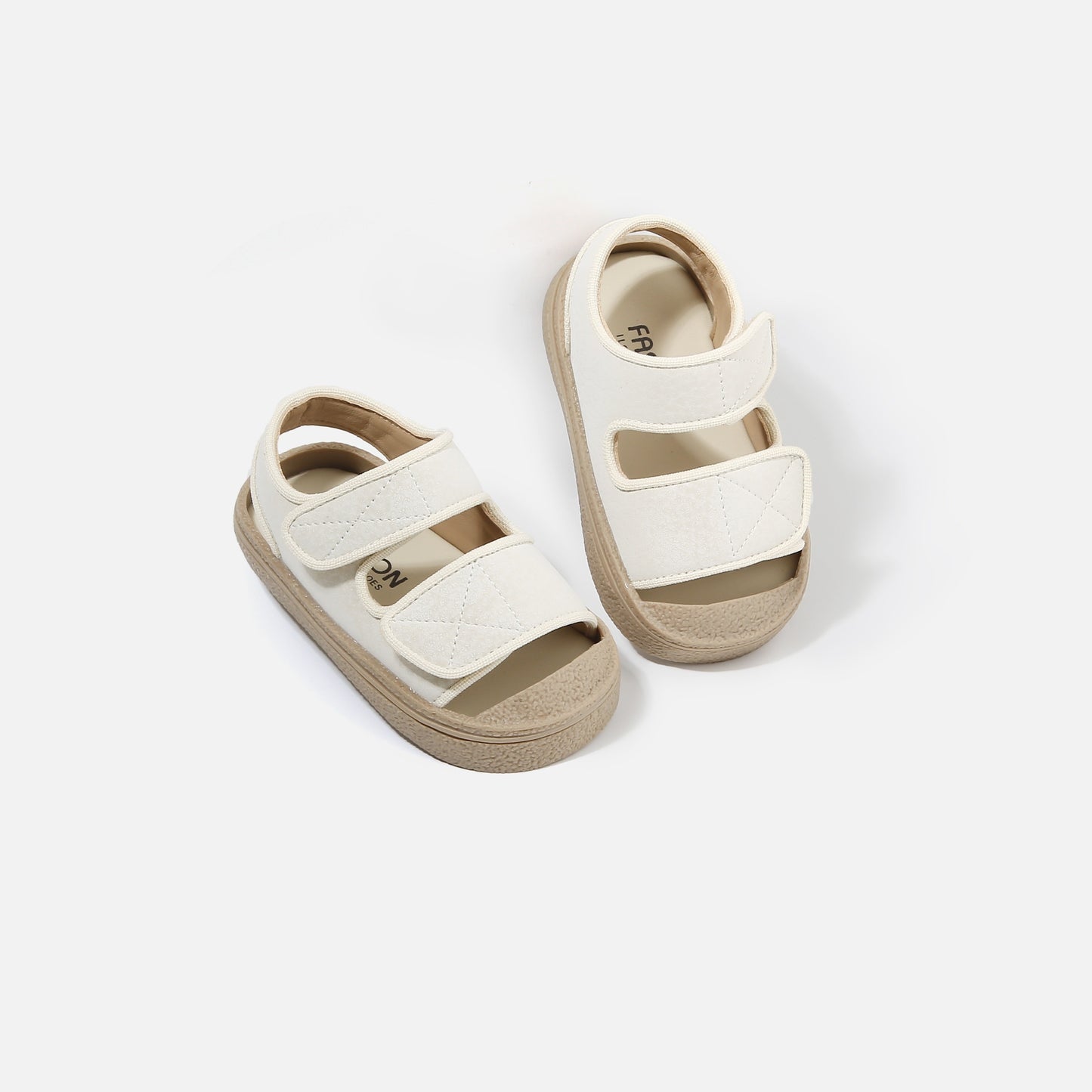 Kids' breathable open-toe footwear with hook-and-loop closure, perfect for beach and leisure activities.