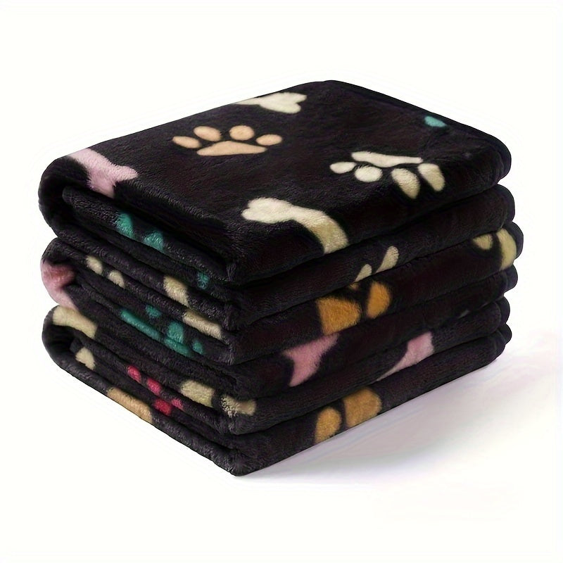 Soft and stain-resistant fleece pet blanket with bone pattern for all sizes of dogs and cats.