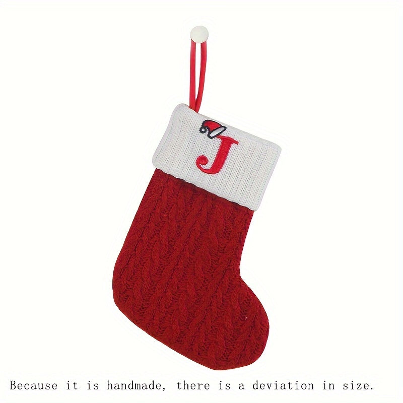 11" Christmas stocking with knitted alphabet design, perfect for hanging on the Xmas tree or using as a gift bag. Made of polyester.