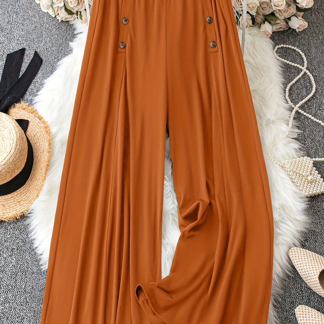 Solid color wide-leg pants for plus-size women with button details