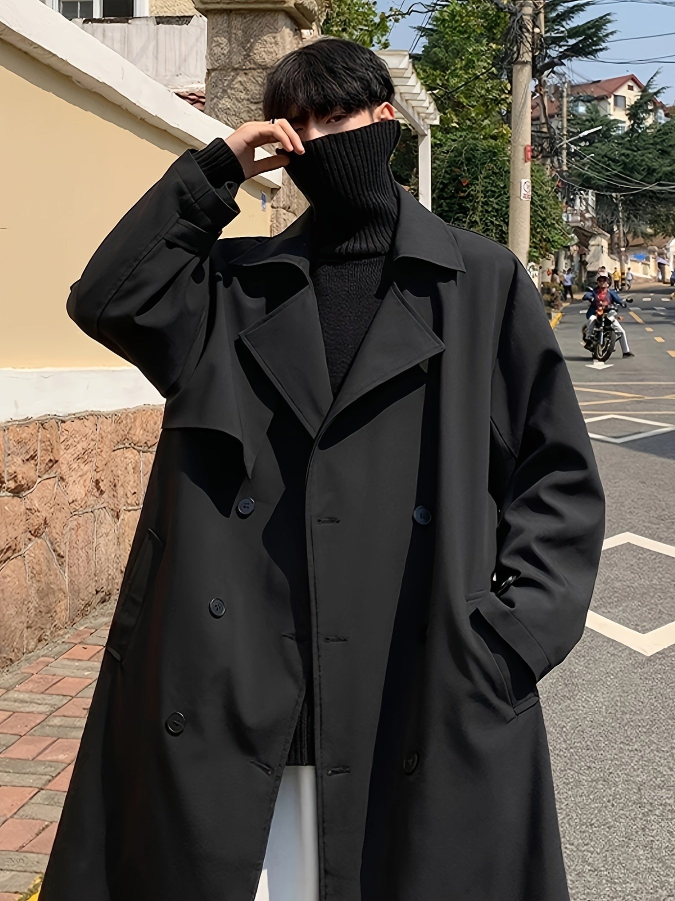 Men's double-breasted overcoat with pockets for outdoor activities.