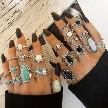 Collection of 39 pieces of stylish bohemian stacked rings for women in retro fashion.