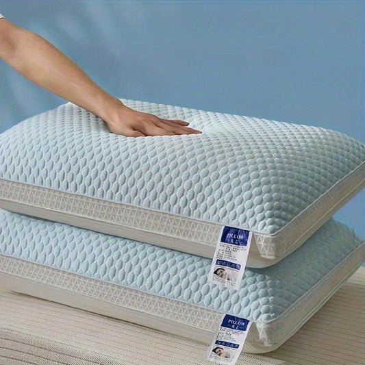 Two cooling tofu pillows designed for neck and spine support. These pillows also provide a relaxing sleep massage and feature breathable, moisture-wicking properties. Perfect for adding a decorative touch to your living room or bedroom.