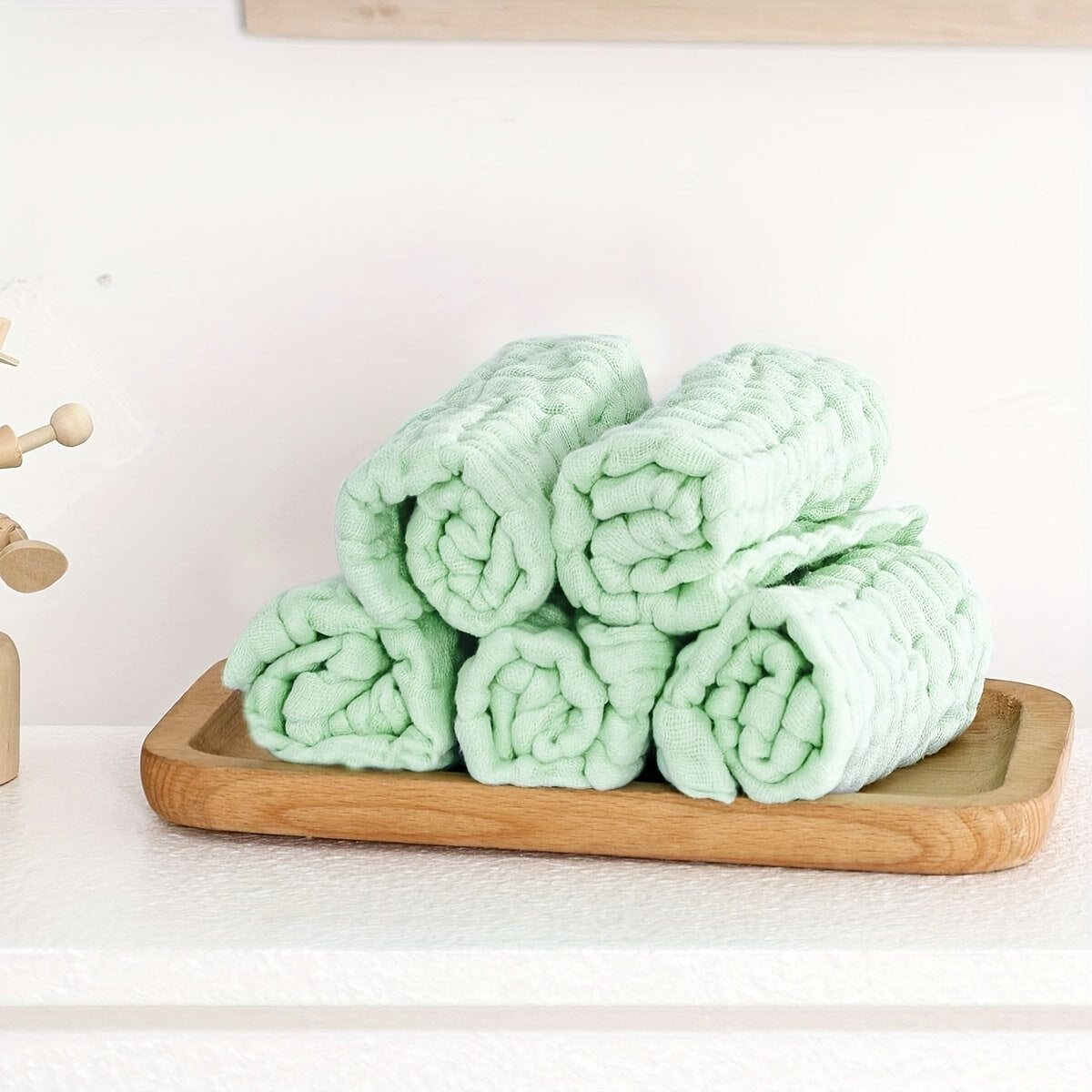 5 pieces of soft muslin washcloths made of 100% cotton, suitable for use as face towels, reusable wipes, or 6-layer bath towels in a plain color design.