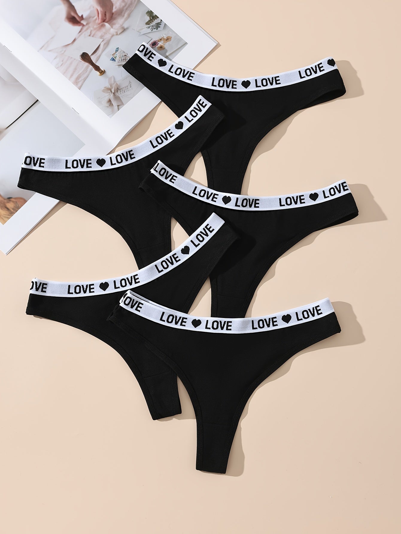 5 pairs of letter print color block thongs, sexy and comfortable breathable stretchy panties for women.