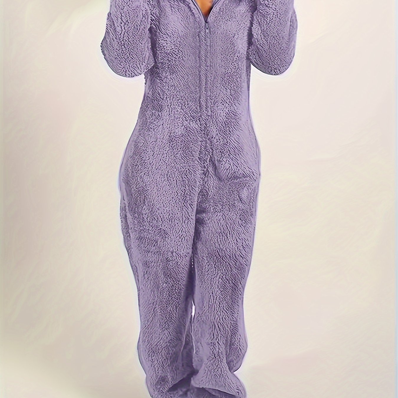 Fuzzy hooded pajama jumpsuit for music festival, comfy and cute lingerie and sleepwear.