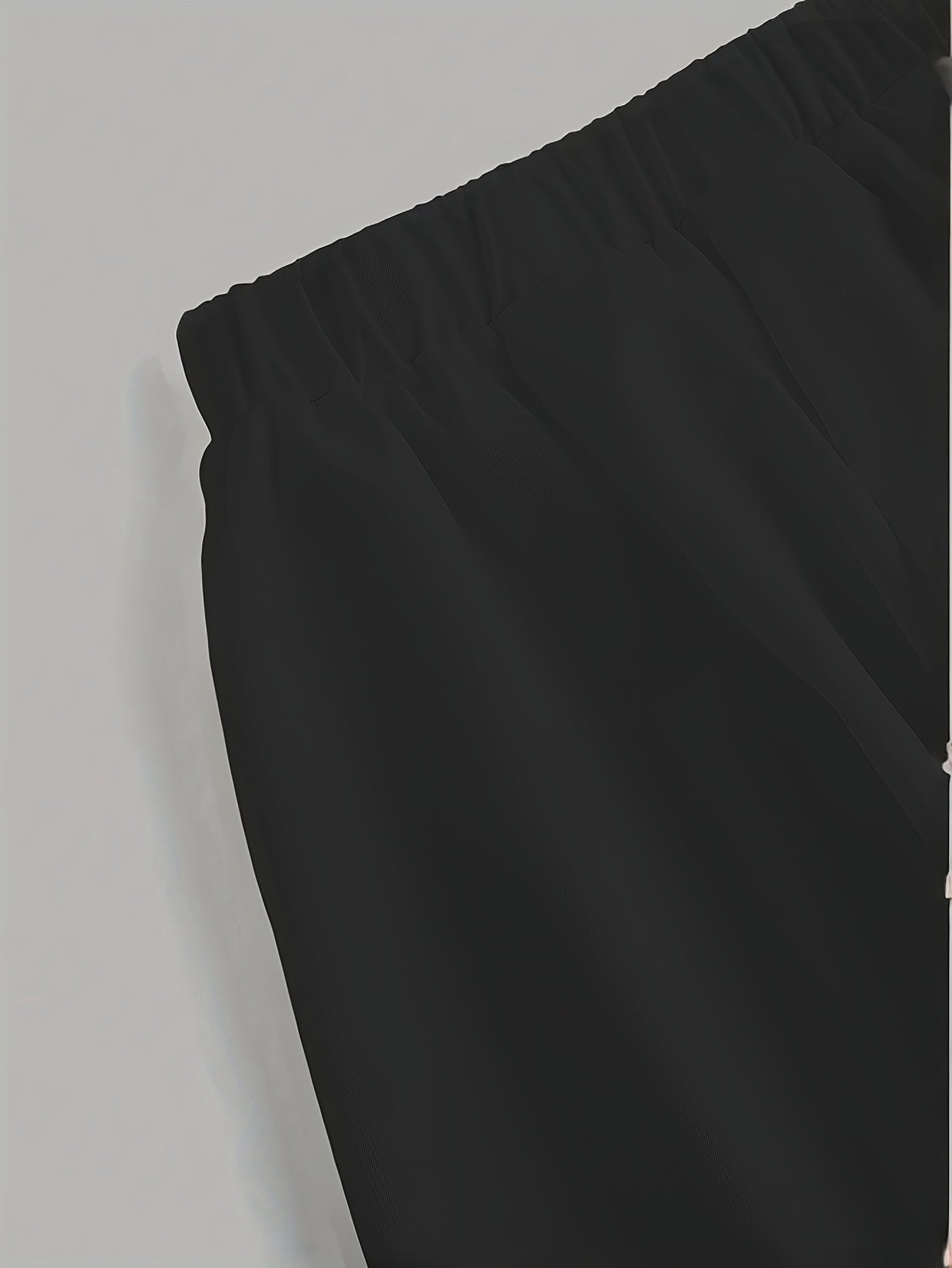 Double-layer high-waisted shorts with lining and lantern shape in solid color.